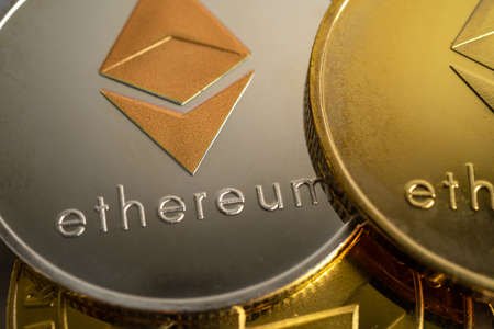 Gold ethereum or electronic worldwide exchange virtual money, blockchain, cryptocurrency online concept.の写真素材