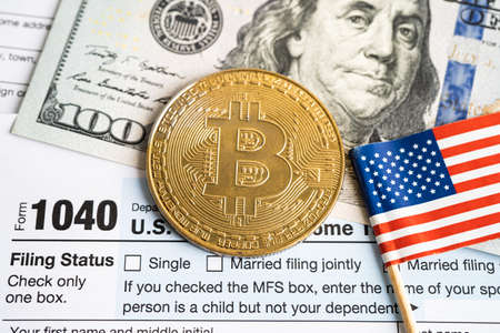 Tax Return form 1040 with USA America flag and dollar banknote, U.S. Individual Income.