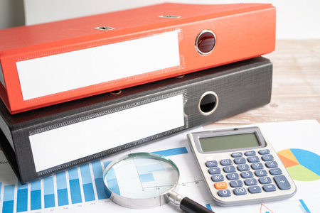 Binder data finance report business with graph analysis in office.の写真素材