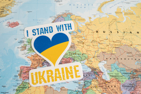 Bangkok, Thailand - September 1, 2022 I stand with Ukraine text with heart flag on world map, stop war with Russia concept.のeditorial素材