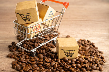 Box with shopping cart logo symbol on coffee beans, Import Export Shopping online or eCommerce delivery service store product shipping, trade, supplier concept.の写真素材