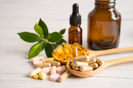 Alternative medicine herbal organic capsule with vitamin E omega 3 fish oil, mineral, drug with herbs leaf natural supplements for healthy good life.の写真素材