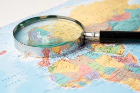 Bangkok, Thailand January 20, 2022 Asia, Magnifying glass close up with colorful world map, travel,...
