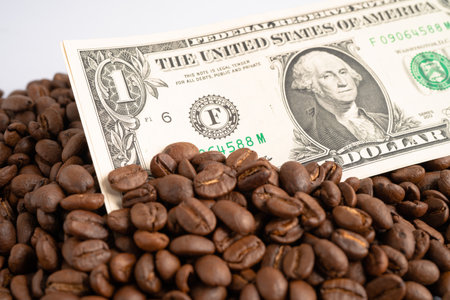 US dollar banknote money on coffee beans, Import Export Shopping online or eCommerce delivery service store product shipping, trade, supplier concept.の写真素材