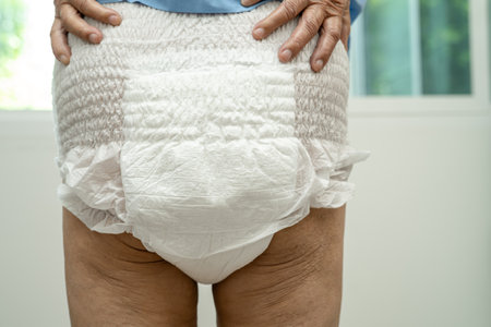 Asian senior woman patient wearing incontinence diaper in hospital, healthy strong medical concept.の写真素材