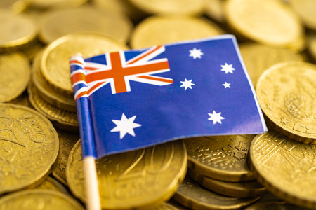 Australia flag on coins money, finance and accounting, banking concept.の写真素材
