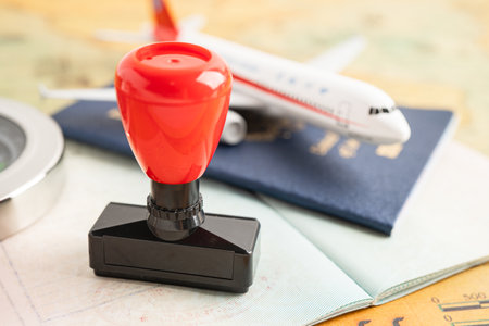 Approved Stamp visa and passport document to immigration at airport in country.の写真素材