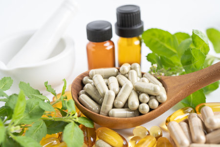 Alternative medicine herbal organic capsule with vitamin E omega 3 fish oil, mineral, drug with herbs leaf natural supplements for healthy good life.の写真素材