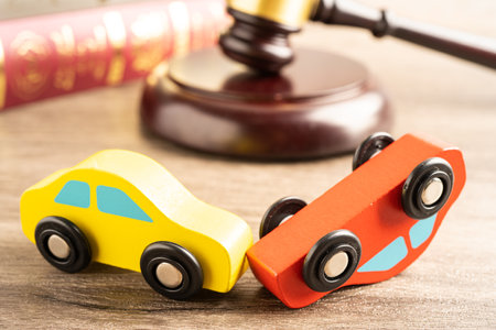 Hammer gavel judge with car vehicle accident, insurance coverage claim lawsuit court case.の写真素材