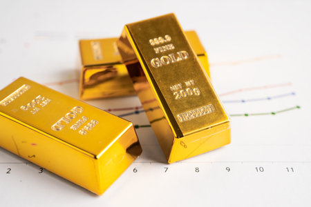 Gold bar on graph, economy finance exchange trade investment concept.
