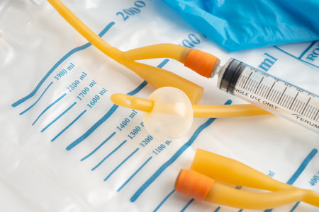 Foley urinary catheter with urine bag for disability or patient in hospital.の写真素材