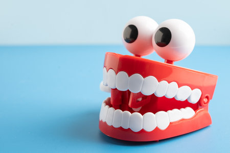 Tooth funny toy denture red color jaw and eye.の写真素材