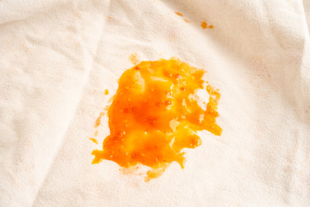 Dirty tomato sauce stain or ketchup on cloth to wash with washing powder, cleaning housework...