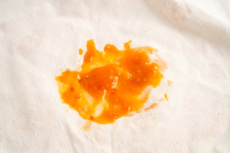 Dirty tomato sauce stain or ketchup on cloth to wash with washing powder, cleaning housework.