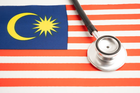 Stethoscope on North Malaysia flag, business and finance.の写真素材