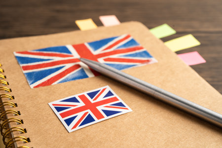UK flag with pen on english language book.の写真素材