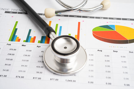 Stethoscope on graph paper, Finance, Account, Statistics, Investment, Analytic research data economy and Business company concept.の写真素材