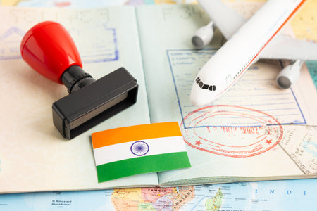 Approved Stamp visa and passport with India flag document to immigration at airport in country.の写真素材