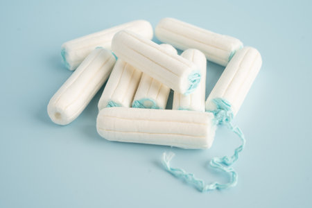 Menstruation cycle with sanitary cotton tampon for woman hygiene and protection.の写真素材