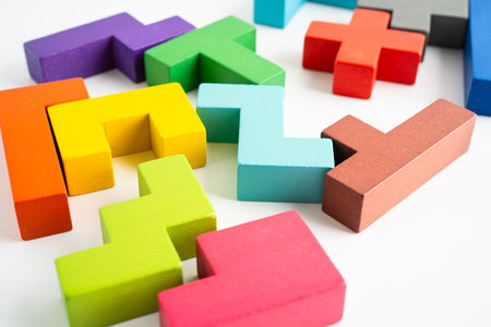 Logical thinking and problem solving creative business solution concept, wooden puzzle geometric shape block shape.の写真素材