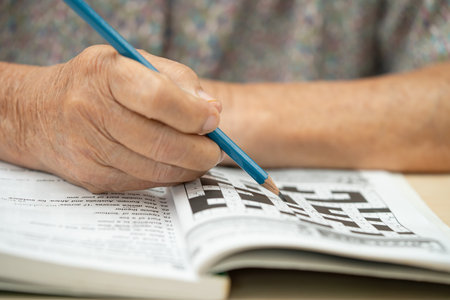 Bangkok, Thailand, March 1, 2023 Asian elderly woman playing puzzle game.のeditorial素材