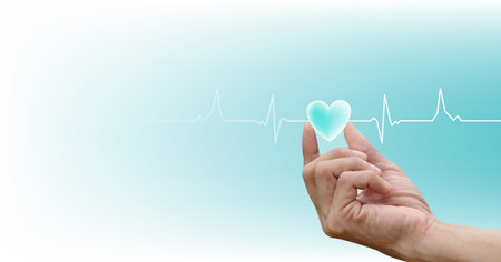 Healthcare concept. heart-shaped on hand with the heartbeat line pulse rhythm icon on blue, white...