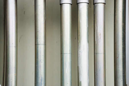 verticle iron pipes pattern backgroundの写真素材
