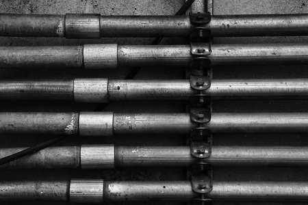 horizontal iron pipes pattern backgroundの写真素材
