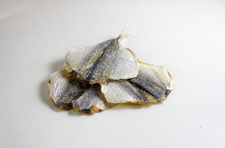 Sun-dried sea fish on a white background