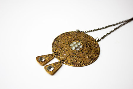 jewelry necklace with precious stones on a white background close upの写真素材