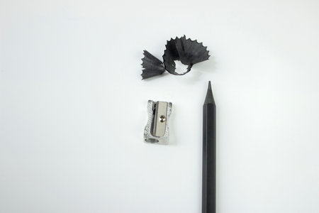 Pencil sharpener and black pencil on white background. Isolated.の写真素材