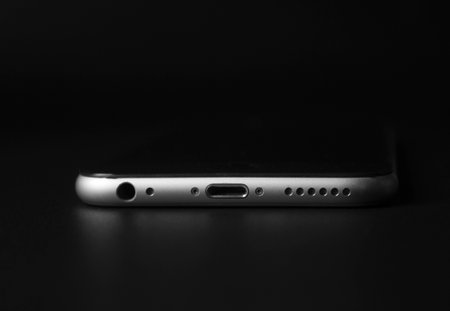 black and white photo of a smartphone on a black background close-upの写真素材