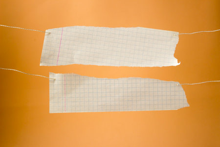 Torn paper with space for text on orange background, stock photo