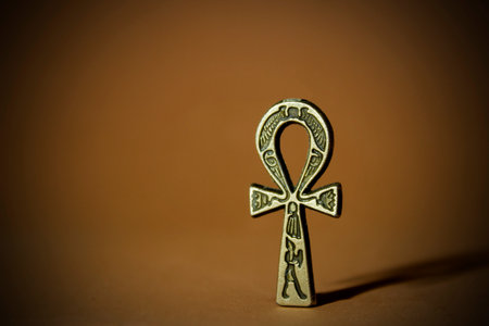 The image depicts the ankh symbol. This symbol is often associated with ancient Egyptian culture and symbolizes life or immortality.の写真素材