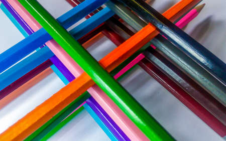 Beautiful assorted colored pencils on white background