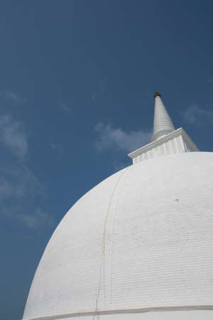 Part of the huge white Mahaseya Stupa (Dagoba) in  Mihintale, Sri Lankaの写真素材