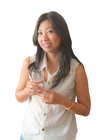 An Asian woman relaxing with drinking water, isolated on white backgroundの写真素材