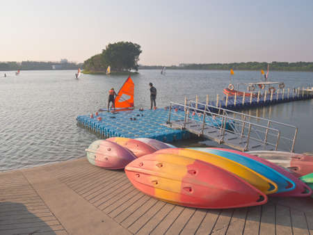 BANGKOK, THAILAND - MARCH 4, 2014 : People enjoy their water sports activity in the lake of Nongbon Water Sports Center in Bangkok, Thailand.のeditorial素材