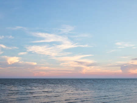 Cloudy blue sky and the sea