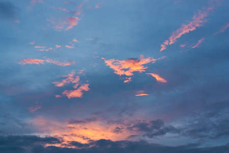 Beautiful scenery of orange clouds on the blue sky