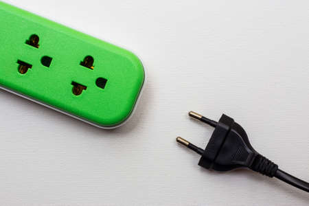 power outlet and power plug on white backgroundの写真素材