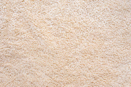 Close up of light colored artificial woolの写真素材