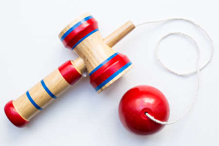 Close up of kendama on white backgroundの写真素材