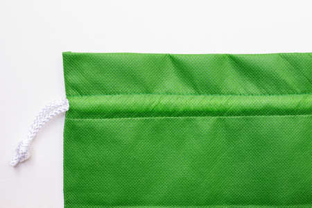 Green cloth bags on white canvas backgroundの写真素材