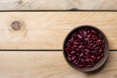 Red beans in can placed on a wooden backgroundの写真素材