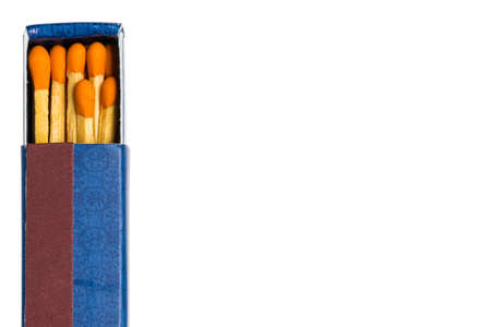 Close up of matchsticks in the blue box on white backgroundの写真素材