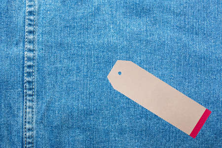 Denim jeans background with seam of jeans fashion design and tagの写真素材