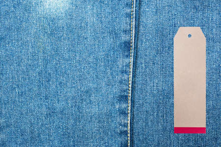 Denim jeans background with seam of jeans fashion design and tagの写真素材