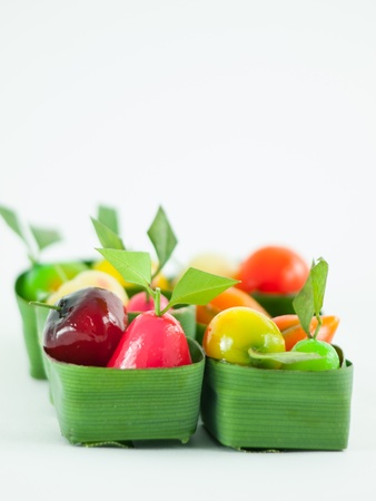 Thai dessert fruit-imitated soybean dumpling coated with jellyの写真素材