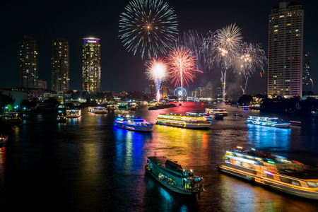 Beautiful firework over Chaopraya river on the night scene for happy new year 2015 at Thailand.